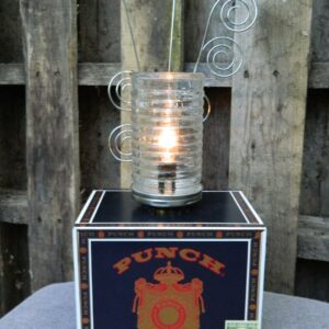 Created from a Punch ciagr box, this Firefly Lamp is a whimiscal gift for the child in all of us.