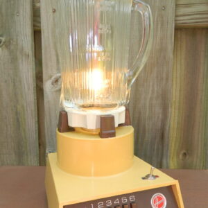 This Hoover Harvest Blender Lamp is a whimsical visit back to the 70's and makes a great Housewarming Gift for any Mid-century Modern Lover. With a flaming light inside and clean lines and bold Gold color on the outside