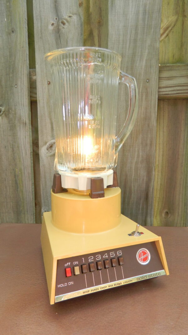 This Hoover Harvest Blender Lamp is a whimsical visit back to the 70's and makes a great Housewarming Gift for any Mid-century Modern Lover. With a flaming light inside and clean lines and bold Gold color on the outside