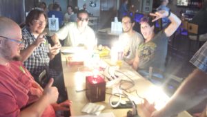 Build & Brew participants react with joy when the switch is filled and their cigar box lamps are illuminated.