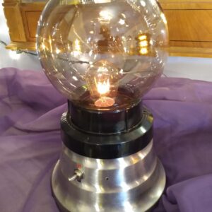This Fortune Teller Lamp sports a brushed stainless steel base and a tinted globe, as well as a low profile, making it a great lamp for any room in the house and a great gift for your best friend.