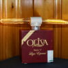 Crafted from a deep red Oliva cigar box, this unique lamp has two light bulbs mounted on top in the configuration of a old-fashioned dynamite plunger handle.